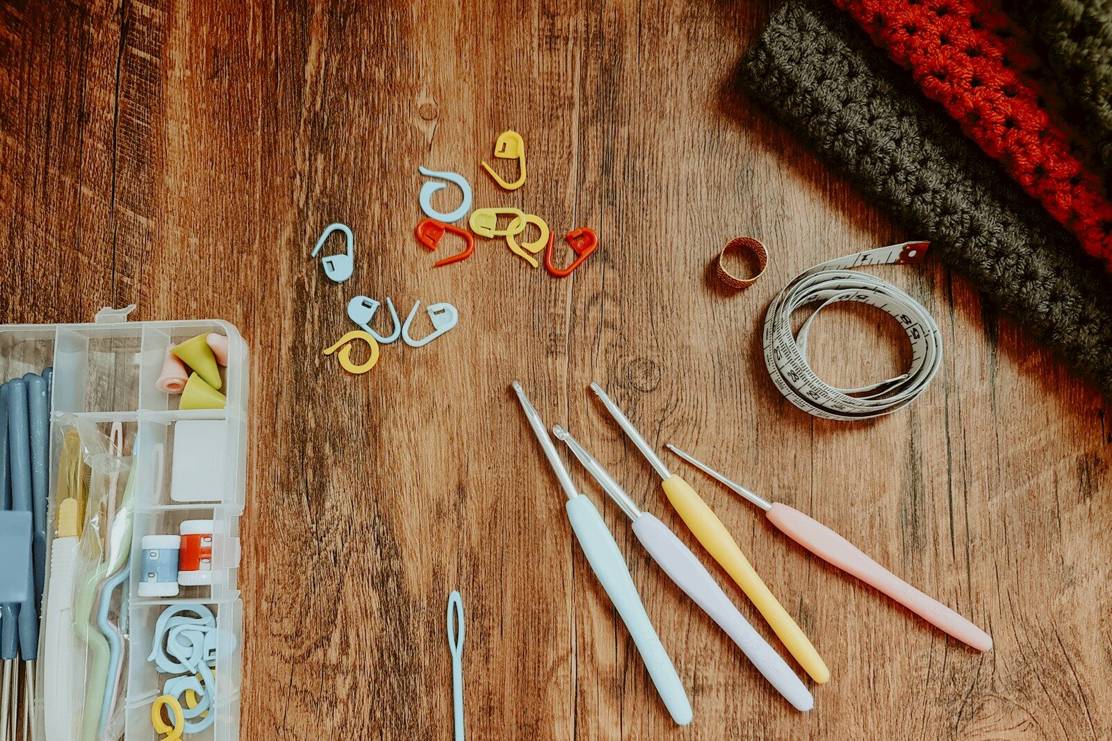 silver and gold rings on brown wooden table